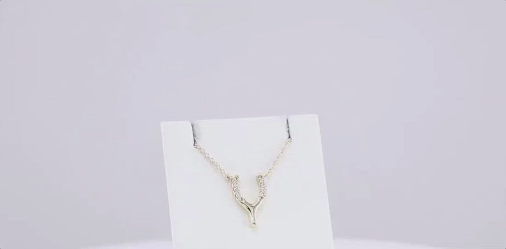 tiny wishbone necklace with diamonds